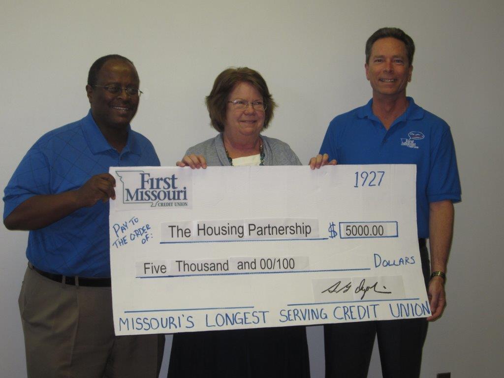 $5,000 grant awarded to The Housing Partnership. FLTR: Reginald Scott, Kate Reese, and Steve Ogolin.